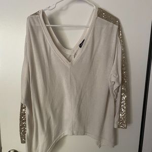 Loose fitted long sleeve sparkly top